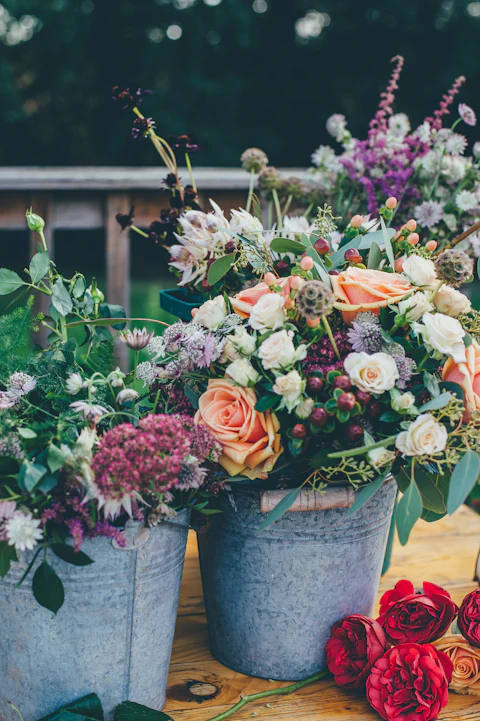 Garden flowers in galvanized buckets